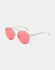 The For Art's Sake® T-shirt - Sunglasses feature round, thin stainless steel frames and pink-tinted lenses with UVA & UVB protection, shown against a white background.