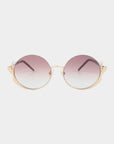The Ariel sunglasses by For Art's Sake® feature round gold frames, gradient pink lenses, and pearl-accented temples—making them a standout accessory, shown on a white background.