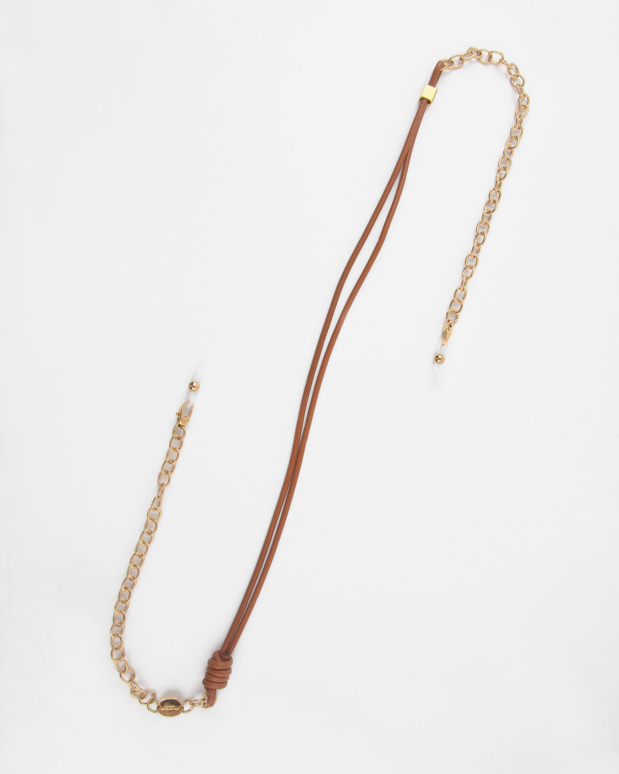 A stylish Soho Glasses Chain featuring a combination of a premium leather cord and 18K gold-plated chain elements by For Art's Sake®. The design includes a knot near the end of the leather cord and decorative beads on both the leather and chain sections.
