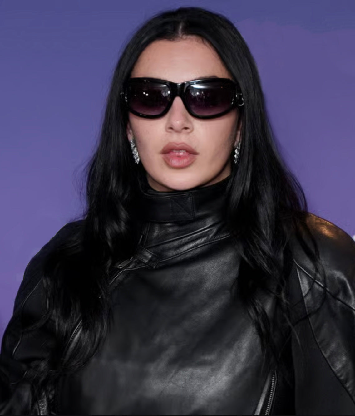 Charli XCX awarded songwriter of the year wearing designer For Art's Sake Raven black sunglasses