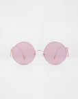 The For Art's Sake® Diptych - Pink sunglasses feature thin pink metal frames, light pink lenses, jadestone nosepads for comfort, and UV protection. Only 2 left. Displayed on a plain white background.