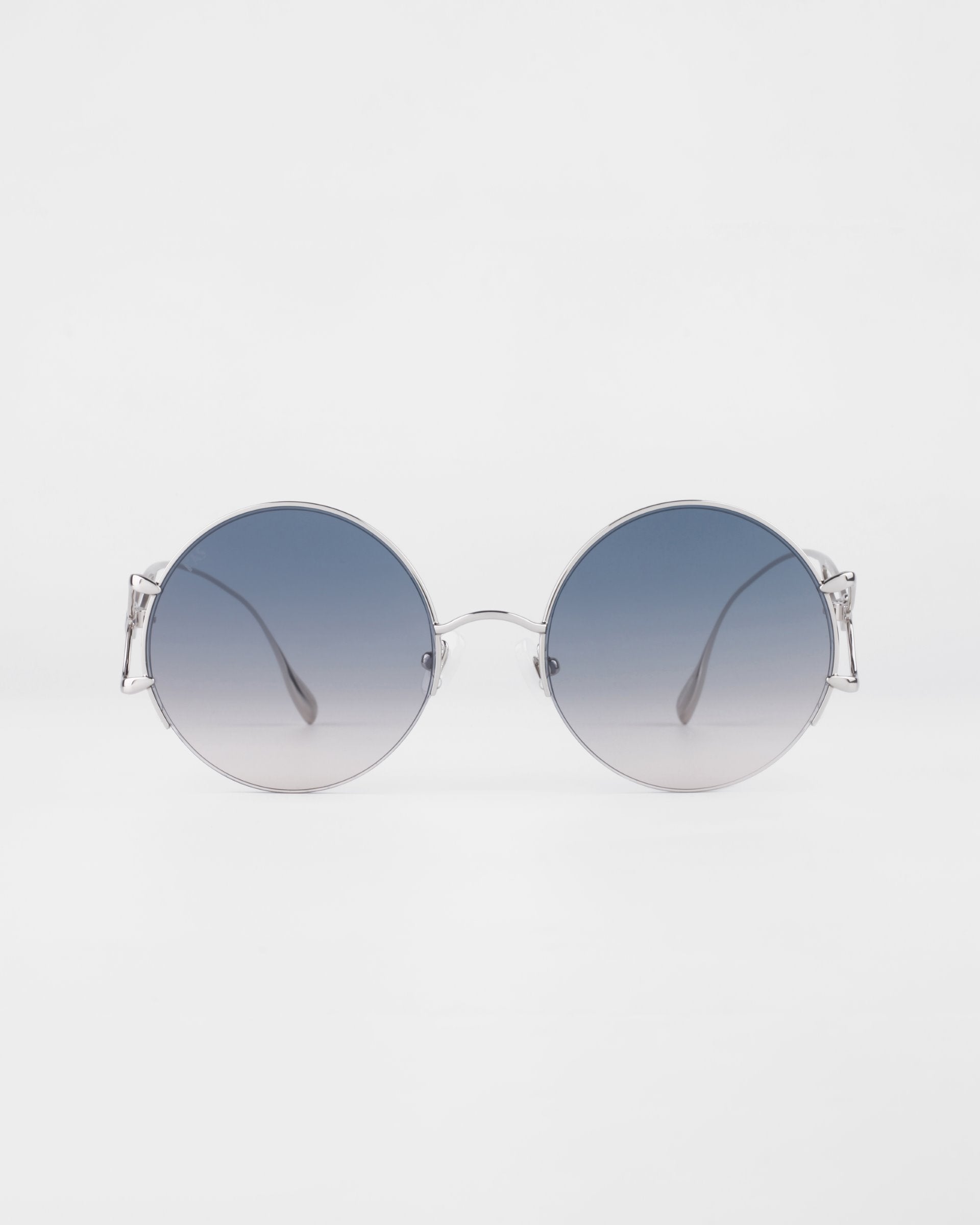 Diptych Sunglasses in Topaz. Front View.