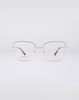 A pair of For Art's Sake® Dora frames featuring thin gold wire and blue light filter lenses is centered against a plain white background.