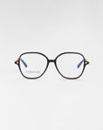 A pair of black-rimmed Dumpling eyeglasses with a slight geometric shape. The glasses have clear lenses featuring a blue light filter, and the inside arms are blue. The words "For Art's Sake®" are visible on the left lens. The glasses are set against a plain white background.