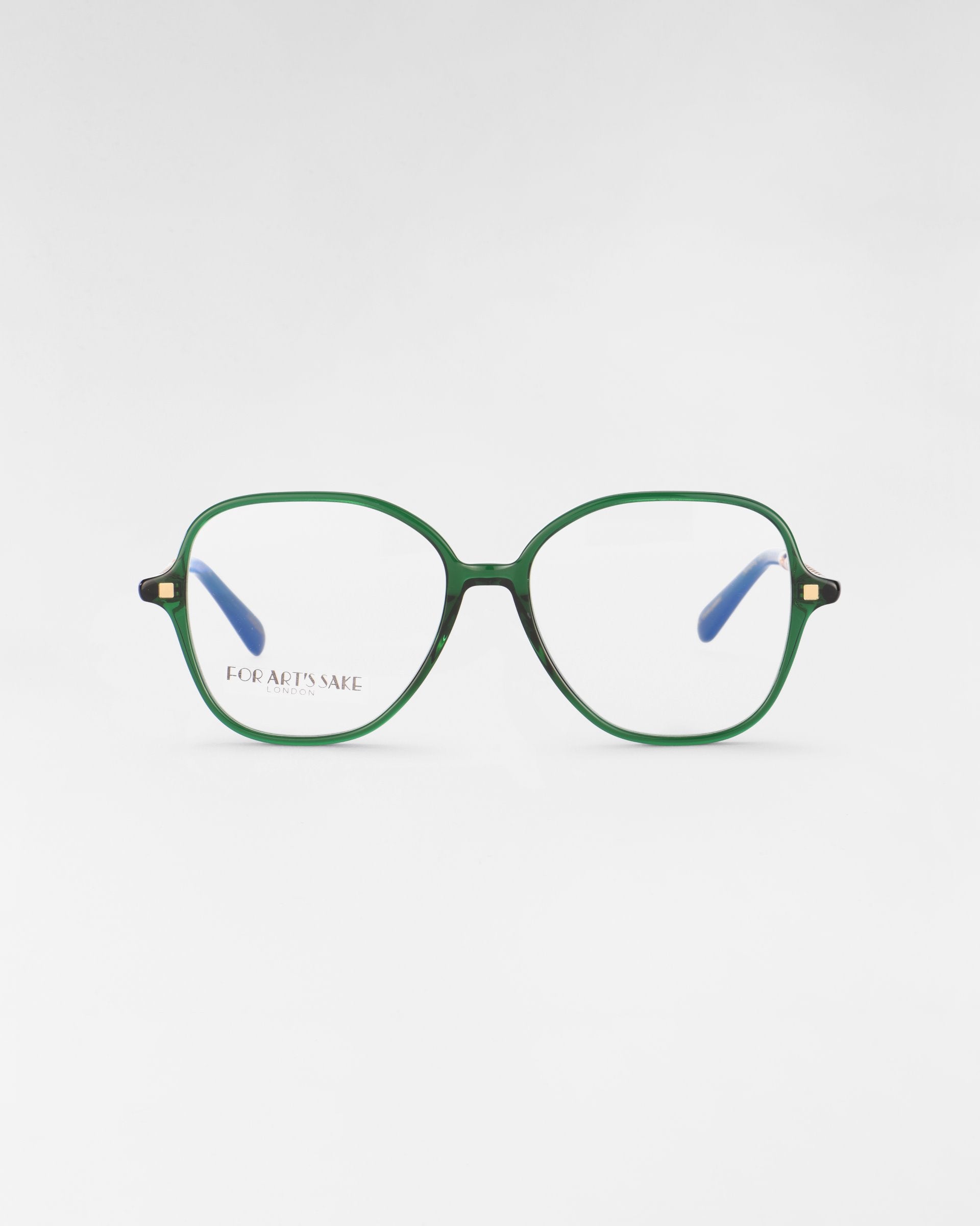 A pair of stylish Dumpling eyeglasses with green frames and square lenses, featuring gold-colored details on the temples. The brand name "For Art's Sake®" is visible in small text on the left lens. These glasses come with a blue light filter for added protection. The background is plain and white.