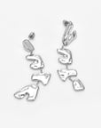 The Forms Earrings by For Art's Sake® are dangling silver earrings featuring abstract, irregular vertical segments that highlight the beauty of organic metal design, shown against a plain white background.