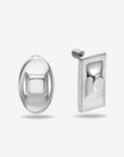The Geometry Earrings by For Art's Sake® feature a modern, minimalist pair: one oval stud with a raised square center and one rectangular earring with a raised circle, shown on a plain white background.