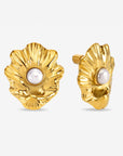 The Shell Earrings by For Art's Sake® are gold shell-shaped studs with a textured finish, featuring a round white pearl at the center. Displayed against a plain white background.
