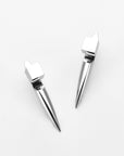 The Droplets Earrings by For Art's Sake®: contemporary silver earrings with square tops and elongated conical drops, shown on a plain white background.