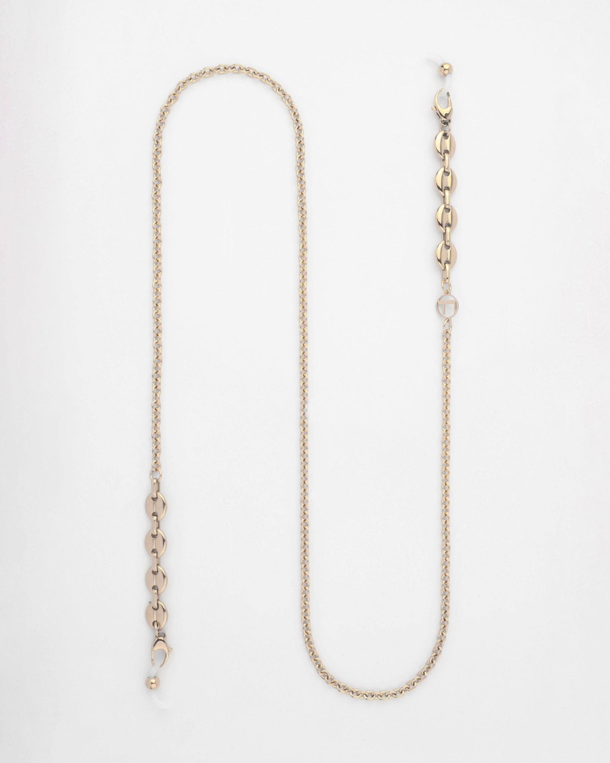 A For Art's Sake® Hackney Glasses Chain laid out in an S-shape against a white background. The chain features a series of interconnected oval links on one end and a small clasp on the other, accented with a stylish freshwater pearl detail.