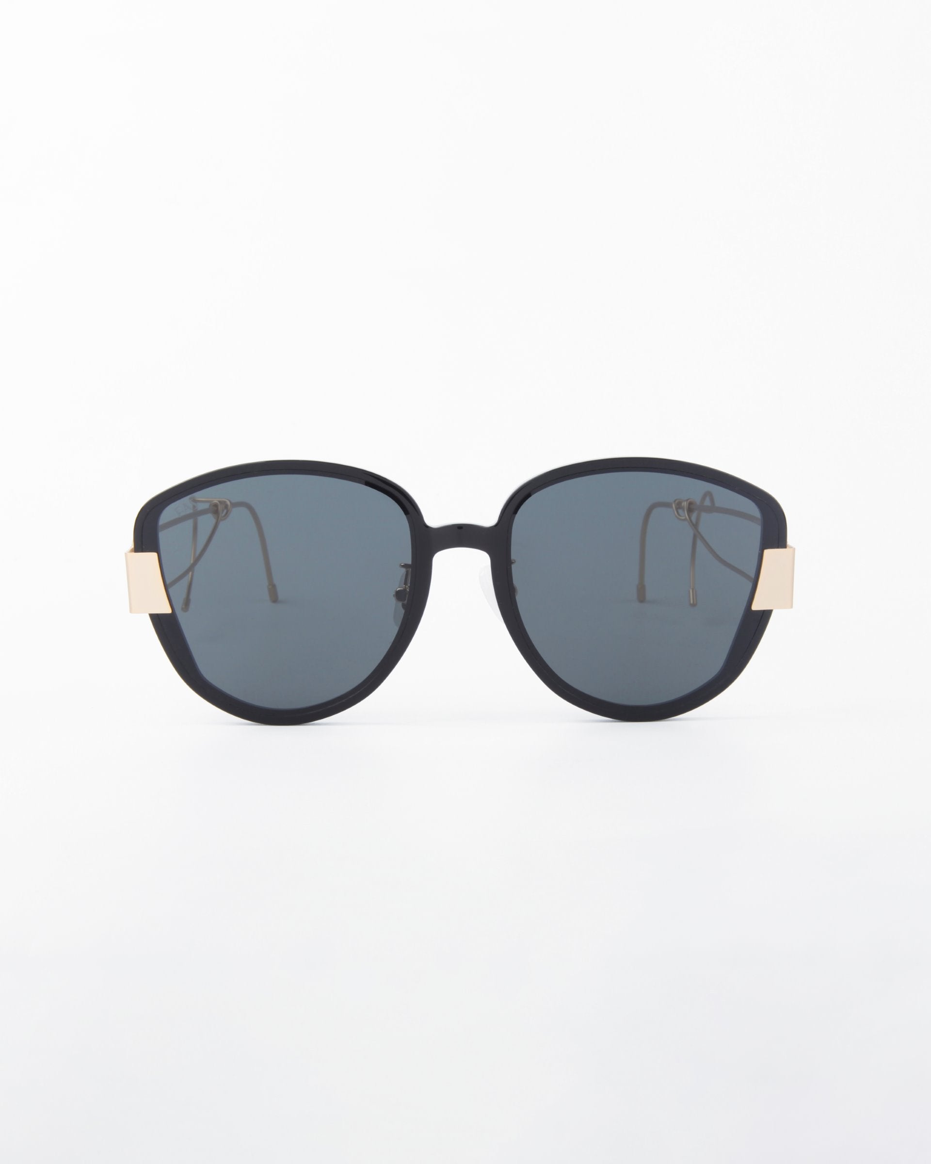 A pair of large, black-framed Mars sunglasses with dark, shatter-resistant nylon lenses and gold-plated stainless steel accents on the temples by For Art's Sake®. The background is plain white, highlighting the sleek and modern design of these UVA & UVB-protected sunglasses.