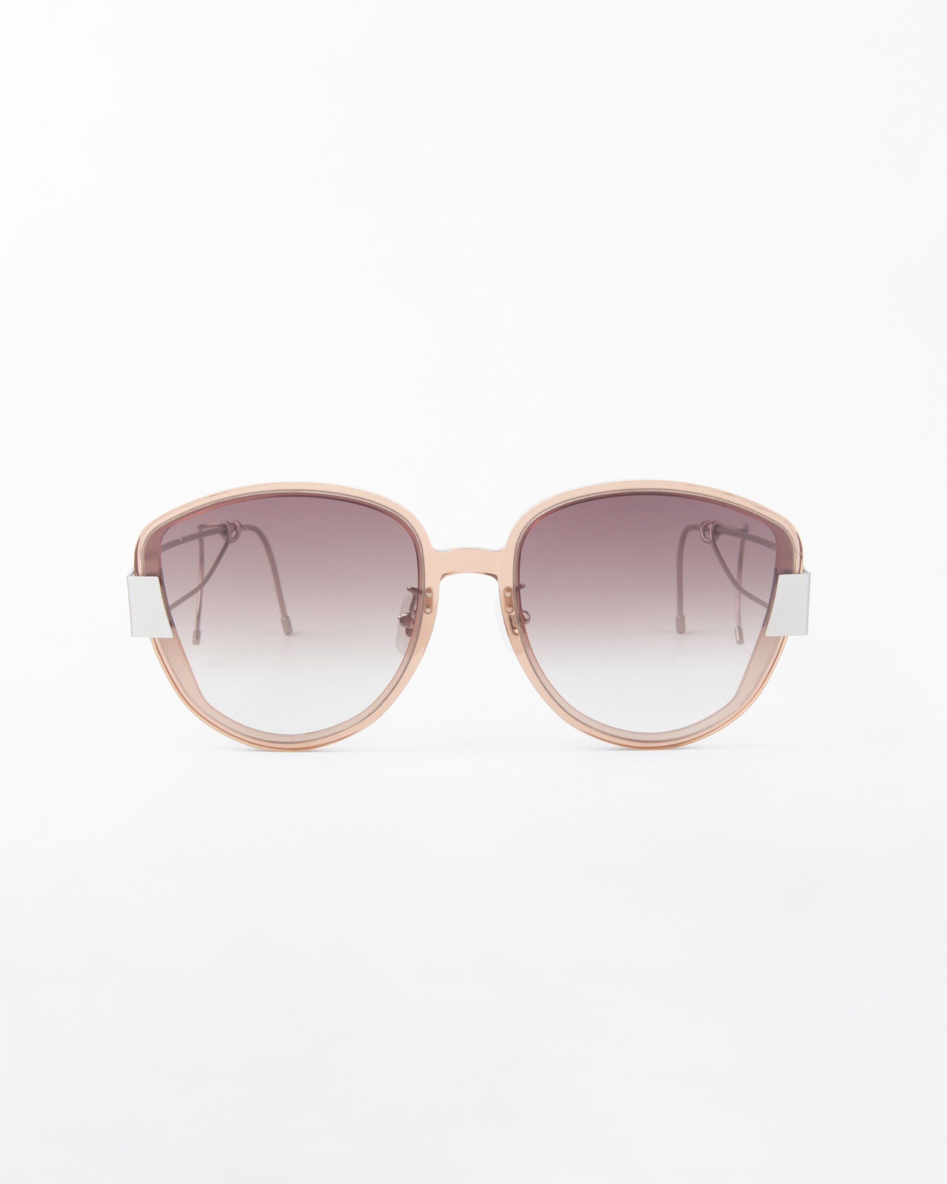 A pair of stylish For Art's Sake® Mars sunglasses with a light pink frame and gradient shatter-resistant nylon lenses that transition from dark gray at the top to lighter at the bottom. The design features square edges and metallic accents on the gold-plated stainless steel temples. The background is plain white.