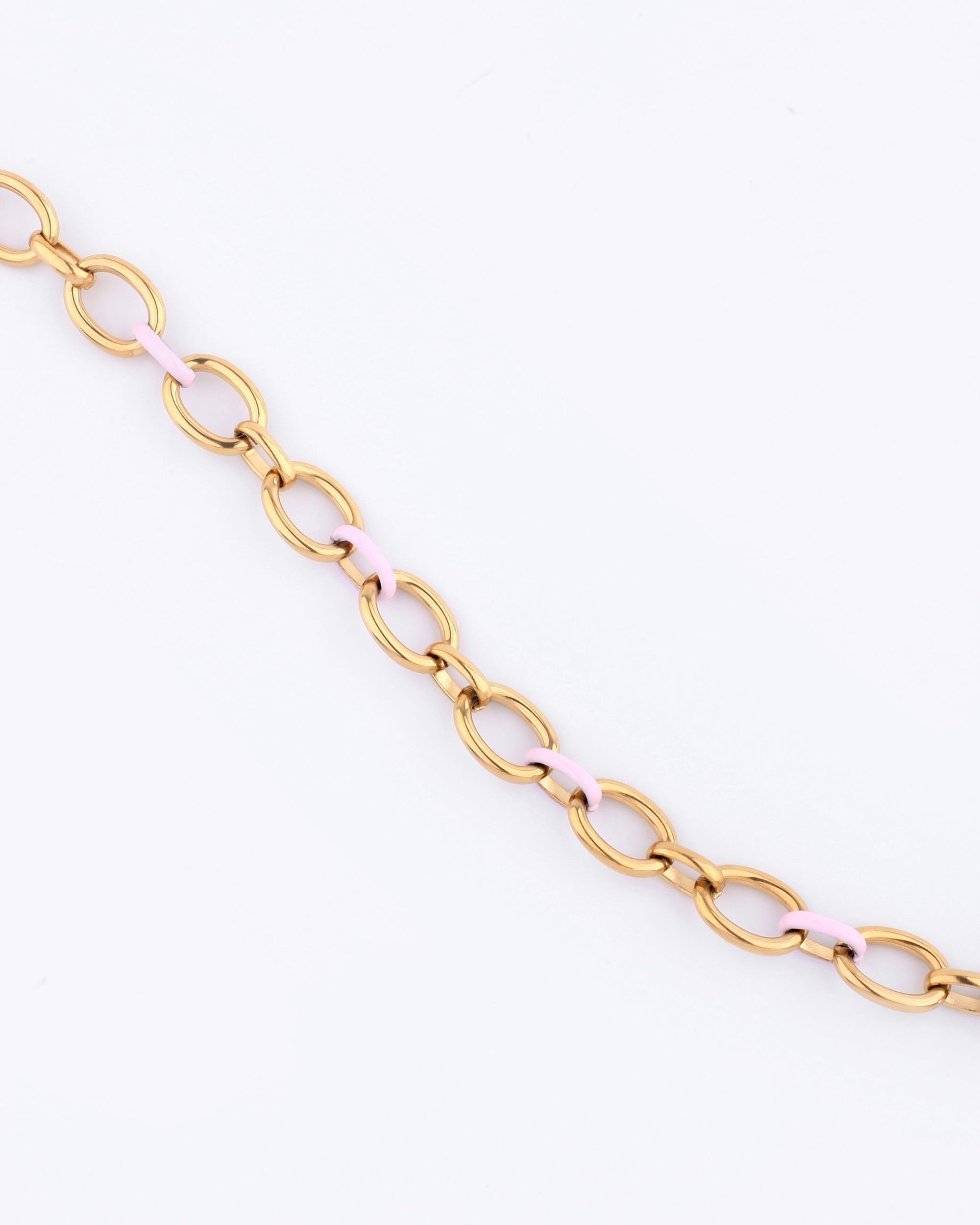 Introducing the Raya Necklace by For Art's Sake®, a stunning 24-karat gold chain featuring oval links and alternating light pink segments, elegantly showcased against a plain white background. This statement piece is perfect for adding a touch of sophistication to any outfit.