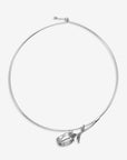 The Rose Choker by For Art's Sake® is a minimalist silver necklace with a sculpted rosebud and leaf pendant, capturing modern elegance in jewelry.