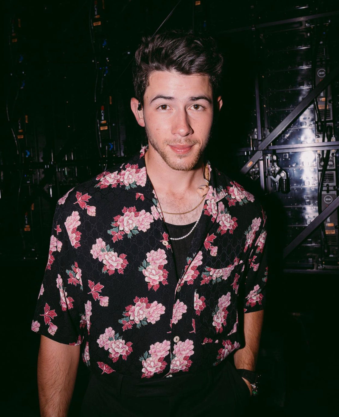 Singer Nick Jonas of the Jonas Brothers wearing designer For Art's Sake Melody pearl necklace at a concert.