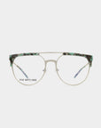 A pair of Frosty prescription glasses from For Art's Sake® with a green tortoiseshell pattern on the brow bar and temple tips. The frame boasts a double bridge design and clear lenses with UV protection. The text "FOR ART'S SAKE" is visible on the left lens against a plain white background.