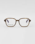 Charm Brown optical glasses displayed against a clean white background by For Art's Sake.