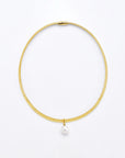 A simple and elegant For Art's Sake® Orbit Necklace Gold made of 24k gold, featuring a smooth, shiny finish and a single dangling freshwater pearl pendant at the center. The necklace is shown against a plain white background.