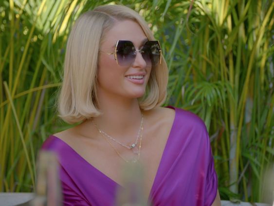 Paris Hilton wearing designer For Art's Sake Generation sunglasses in reality TV show