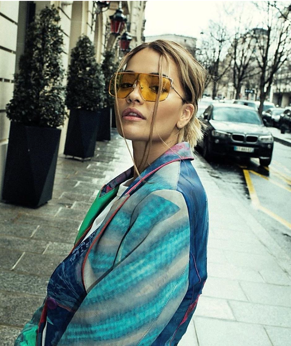 Singer Rita Ora wearing designer For Art's Sake Horizon sunglasses in London.