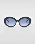 A pair of For Art's Sake® Helios sunglasses featuring an oversized, round design with tinted lenses is displayed against a plain white background, offering a touch of luxury eyewear.