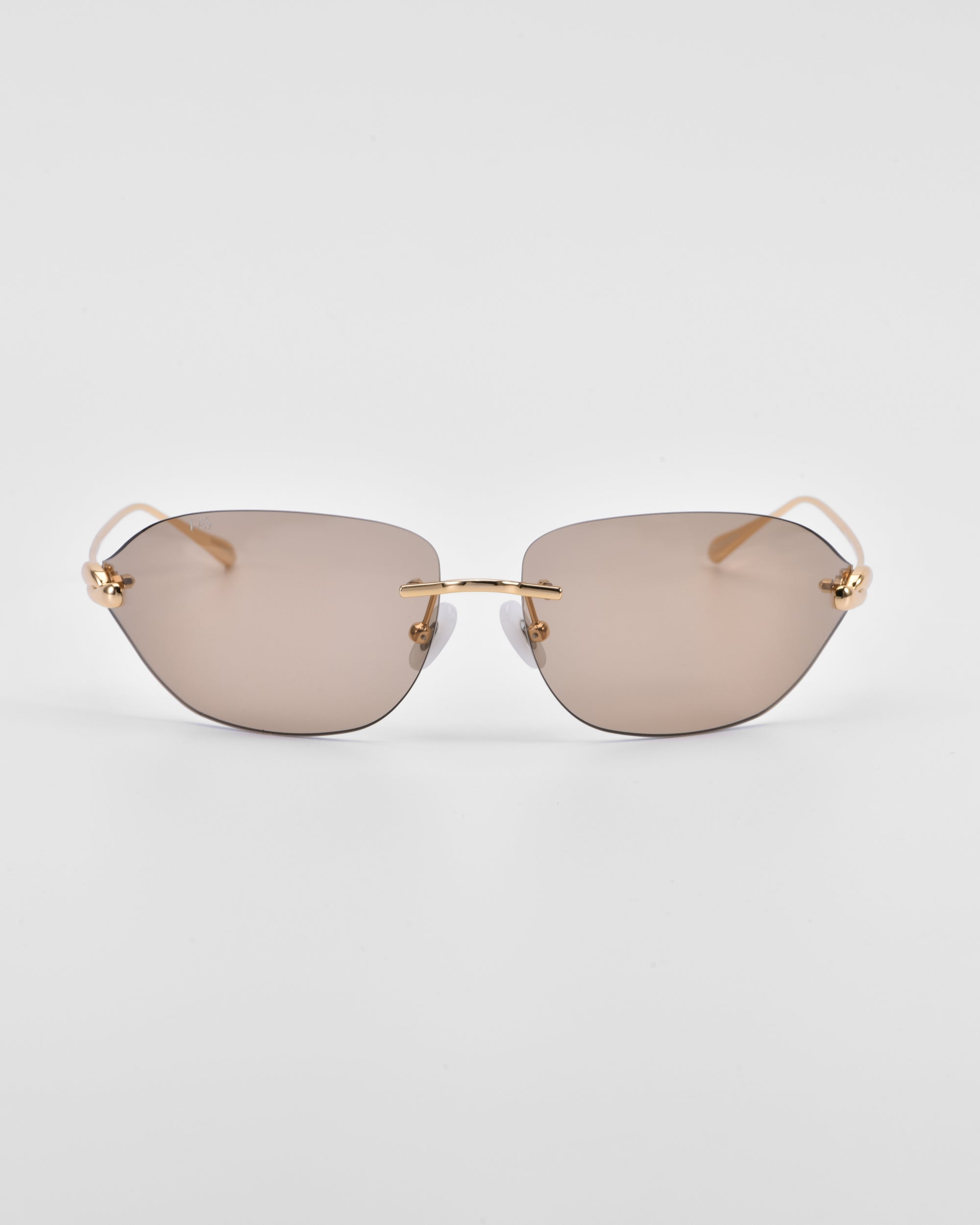 A pair of stylish For Art's Sake® Serpent I sunglasses with gold frames and brown-tinted, rimless lenses set against a white background. The sunglasses have a minimalist design, featuring 18-karat gold plating on the temples and a thin gold bridge across the nose. Natural jade-stone nose pads complete the luxurious look.