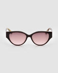 Front view of For Art's Sake® Vincent Van Gogh sunglasses: black cat-eye frames with pink-tinted lenses, shown against a plain light gray background.