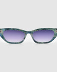 Front view of For Art's Sake® Claude Monet sunglasses with green and blue marbled cat-eye frames and purple gradient lenses, displayed on a light gray background. Limited edition that adds artistic flair to any look.