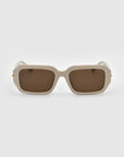 The For Art's Sake® Fleur sunglasses feature a white acetate frame with rectangular shape, dark lenses, and small gold-accented hinges, set against a light gray background.