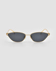 The Tulip II by For Art's Sake® features sculptural gold frames and dark cat-eye lenses, showcased against a plain light gray background.