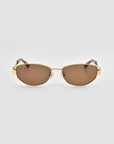 For Art's Sake® Abstraction II sunglasses feature sculptural gold frames and brown-tinted lenses, shown against a plain light gray background.