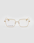 Gold-rimmed, square-shaped "Garden" eyeglasses by For Art's Sake® with clear lenses are displayed on a white background—ideal for those seeking artful, modern optical wear.