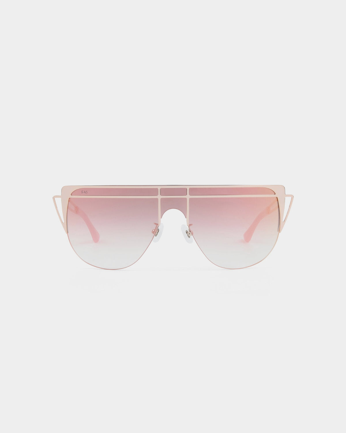 Introducing the For Art's Sake® Alien oversized sunglasses, featuring gold-plated frames and gradient pink-tinted lenses. These chic shades showcase a contemporary design with double bridge detail, subtle nose pads for added comfort, and full UV protection. The white background enhances the stunning aesthetic of these eye-catching sunglasses.