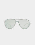 Introducing the Dark Eyes sunglasses by For Art's Sake®, featuring 100% UV protection with light green-tinted nylon lenses. These stylish sunglasses boast a unique double metal frame design, with the upper frame in silver stainless steel and the bottom frame in medium green. The white background accentuates their striking appearance.