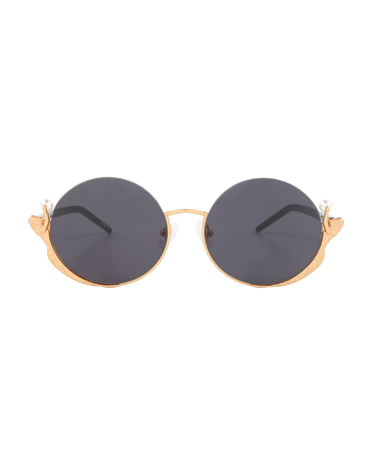 Ariel sunglasses by For Art's Sake® feature round dark lenses, gold-colored frames with decorative upper corner accents, and black temples for a chic finish.