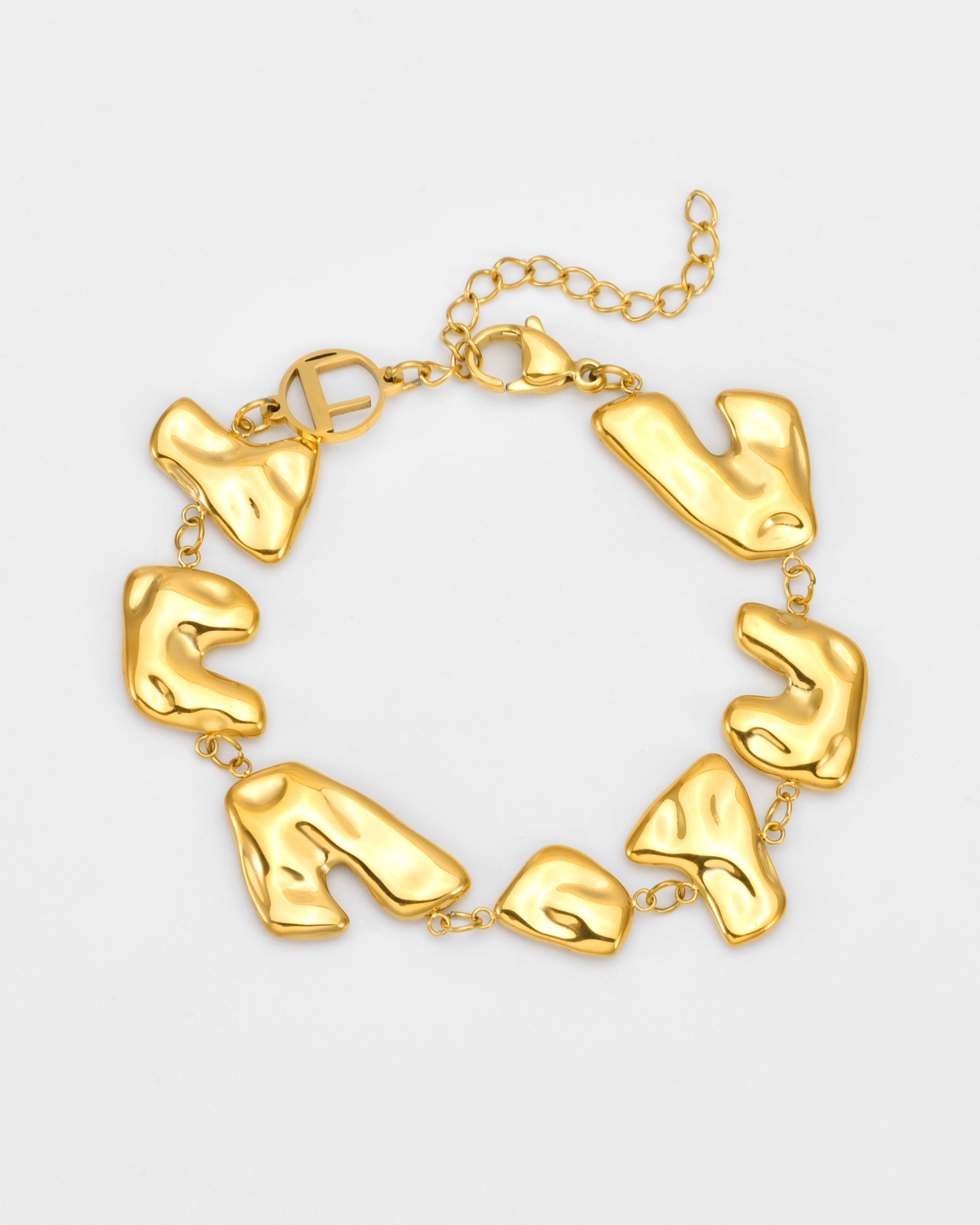The Forms Bracelet by For Art’s Sake® features irregular abstract gold links joined by small rings, adjustable chain, and lobster clasp, displayed on a plain light background.
