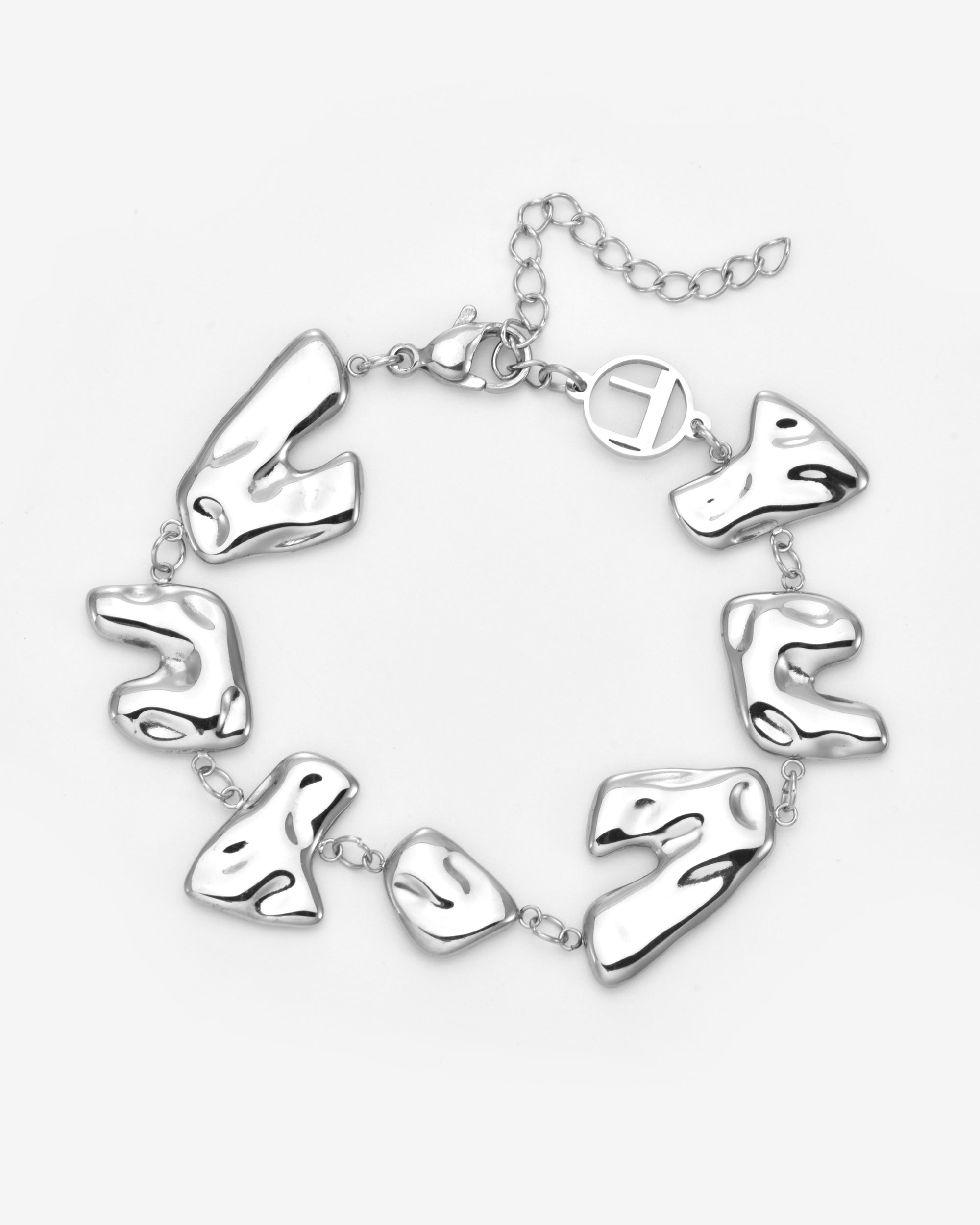 The Forms Bracelet by For Art's Sake® showcases seven organic metal shapes linked by small rings, finished with a lobster clasp and adjustable chain. Ideal for layering, it's featured against a plain white background.