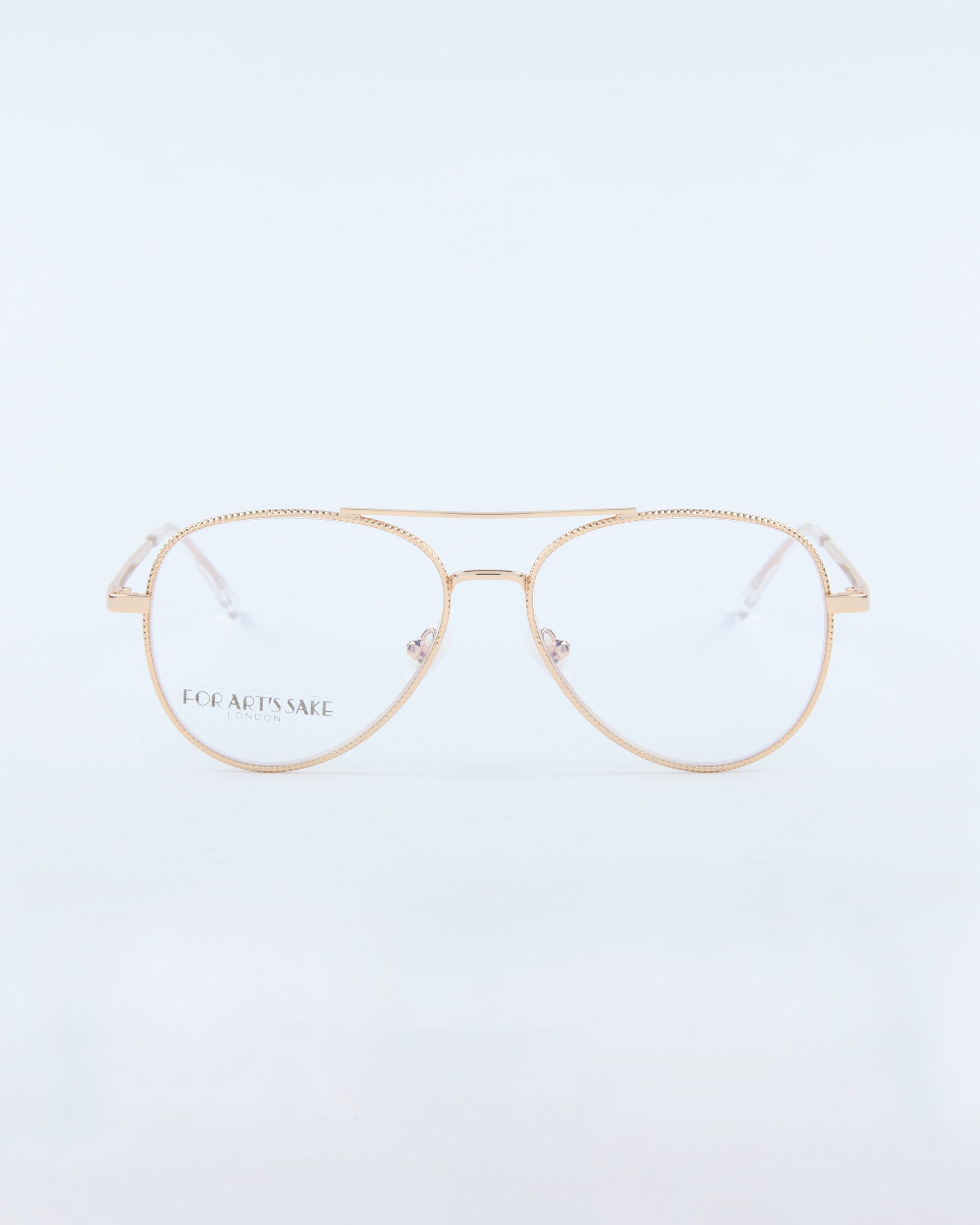 For Art’s Sake® Cleo: Gold-rimmed aviator-style eyeglasses with clear lenses and thin metal frames, shown on a plain light background. Final sale—no returns.