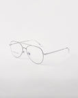 The Cleo glasses by For Art's Sake® feature sleek, silver-rimmed optical frames with a minimalist design, set against a plain white background. These stylish glasses have slightly rounded prescription lenses and delicate, thin arms.