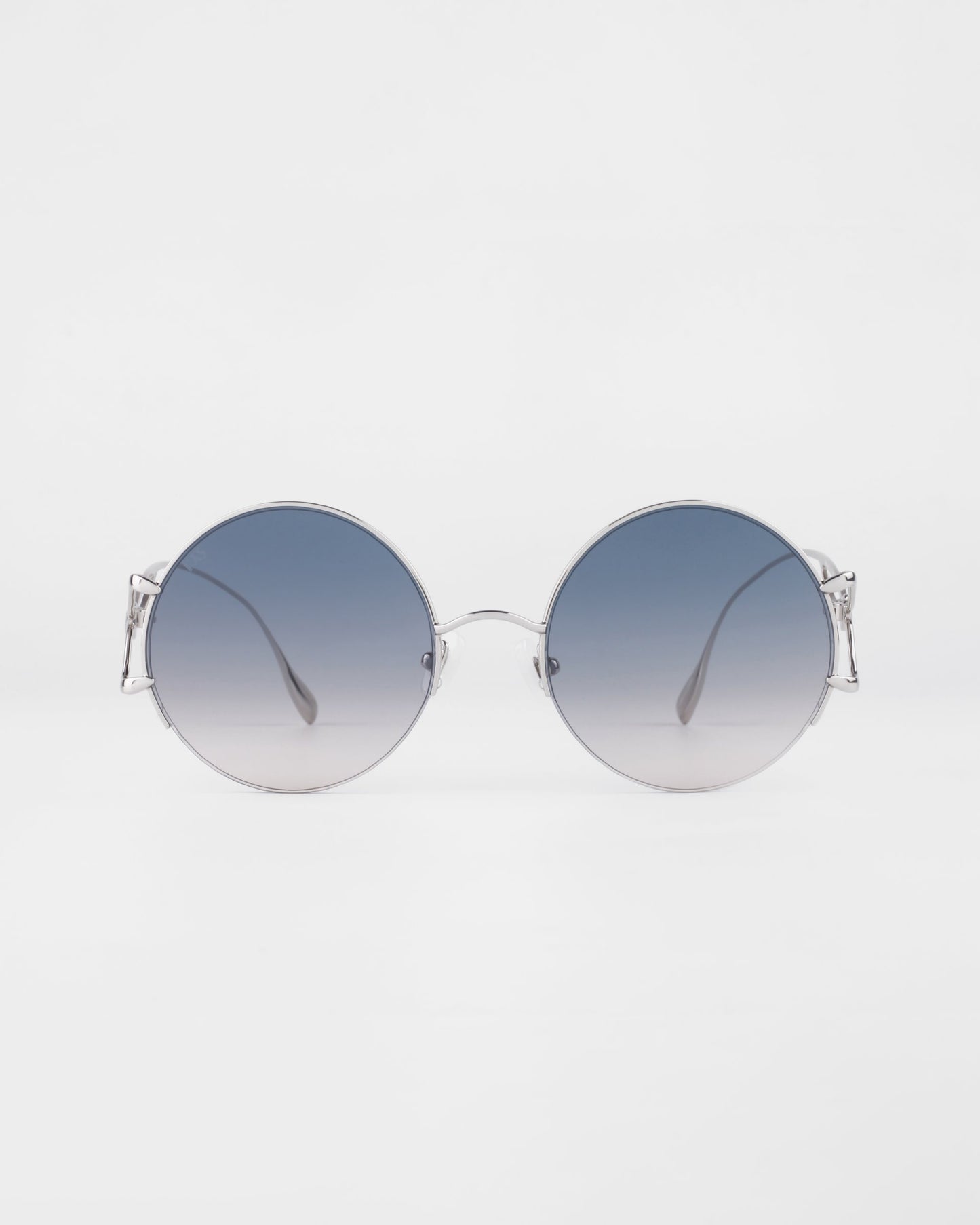 Diptych Sunglasses in Topaz. Front View. 