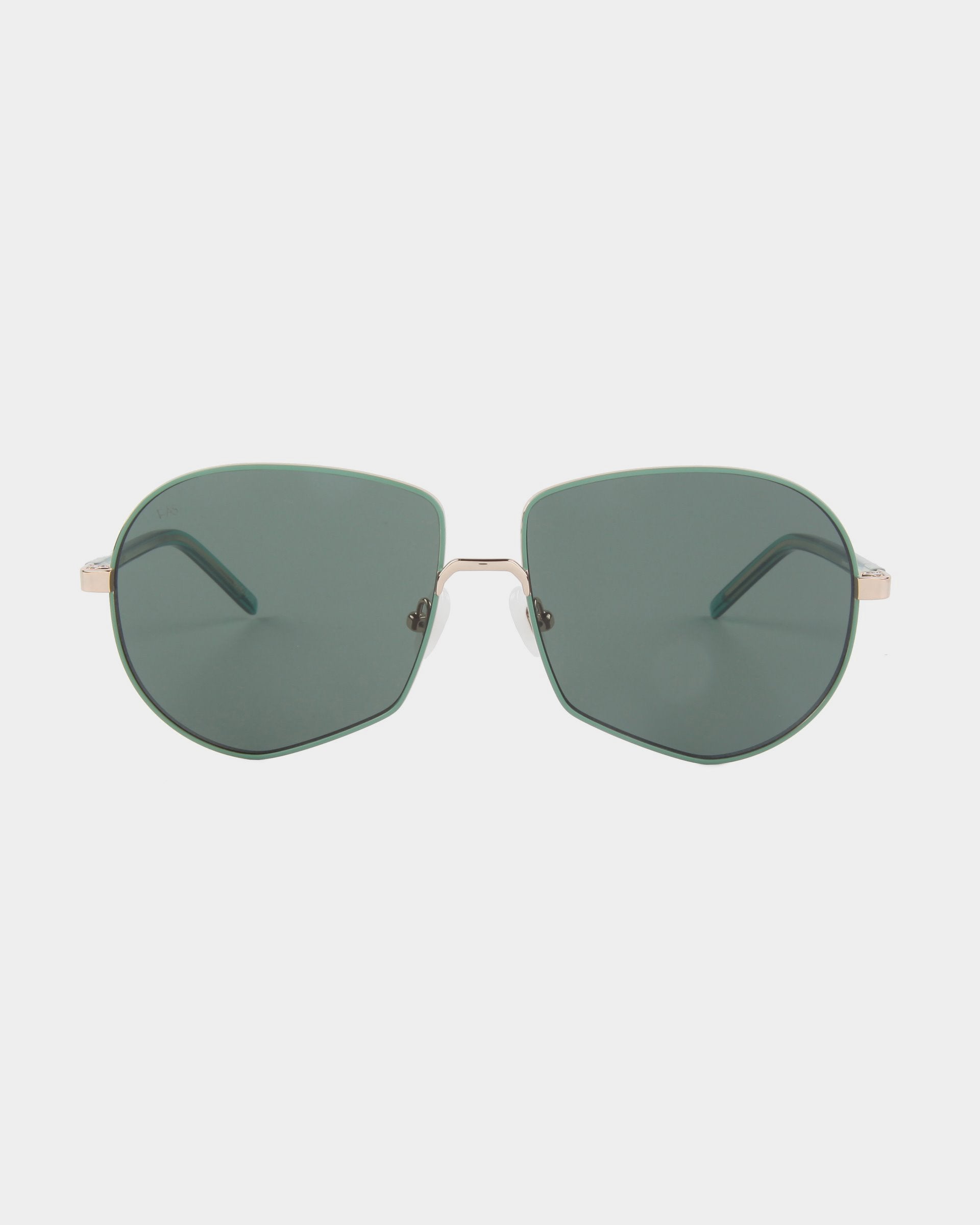 These For Art's Sake® Explorer aviator shades feature dark green tinted lenses and thin, gold metal frames. The sunglasses boast a minimalist design with a double bridge and slender temples, offering both style and UV protection.