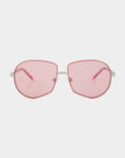 A pair of Explorer Pink sunglasses by For Art's Sake® with pink-tinted lenses and a sleek, silver metal frame. The UV-protected lenses are octagonal in shape, and the arms have a subtle, thin design. The plain white background showcases the modern and stylish design of these sunglasses.
