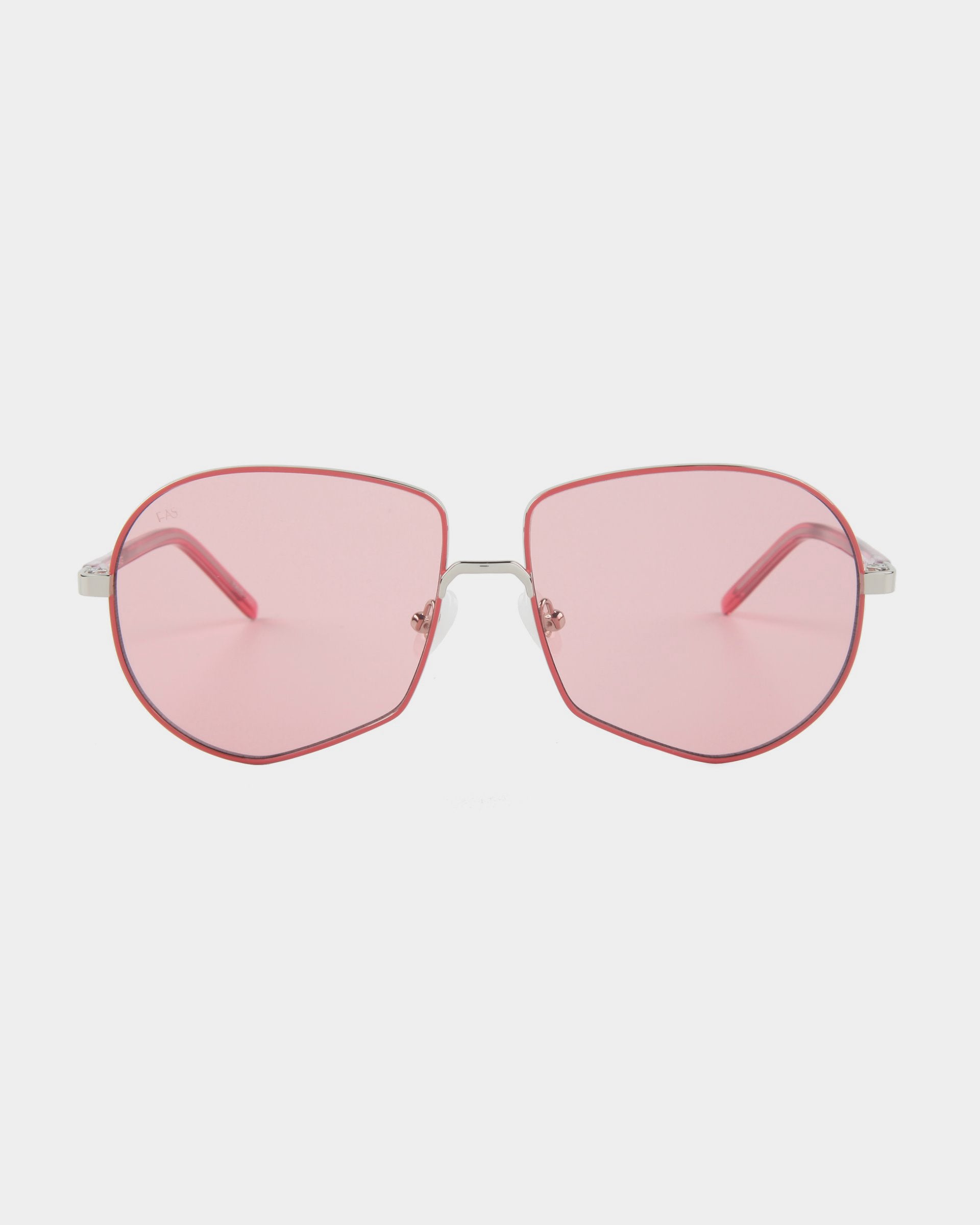 For Art's Sake® Explorer sunglasses, as worn by Beyoncé, feature large pink geometric nylon lenses and thin silver metal frames with adjustable nosepads, showcased against a white background.