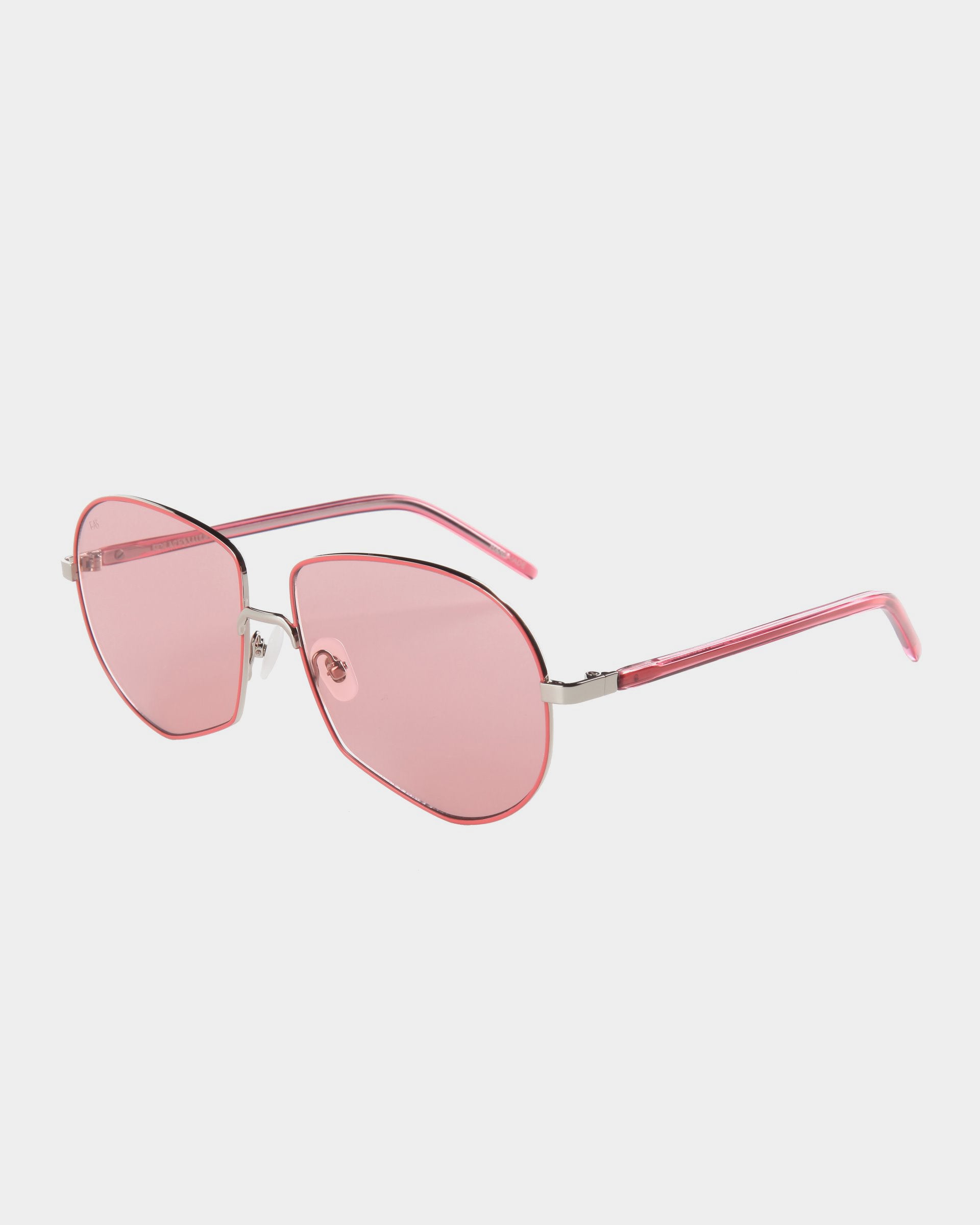 A pair of For Art's Sake® Explorer Pink UV-protected sunglasses with pink-tinted lenses and stylish pink and silver frames. These contemporary aviator shades feature thin, angular metal frames and pink-tipped arms. The background is plain white, highlighting their chic design.