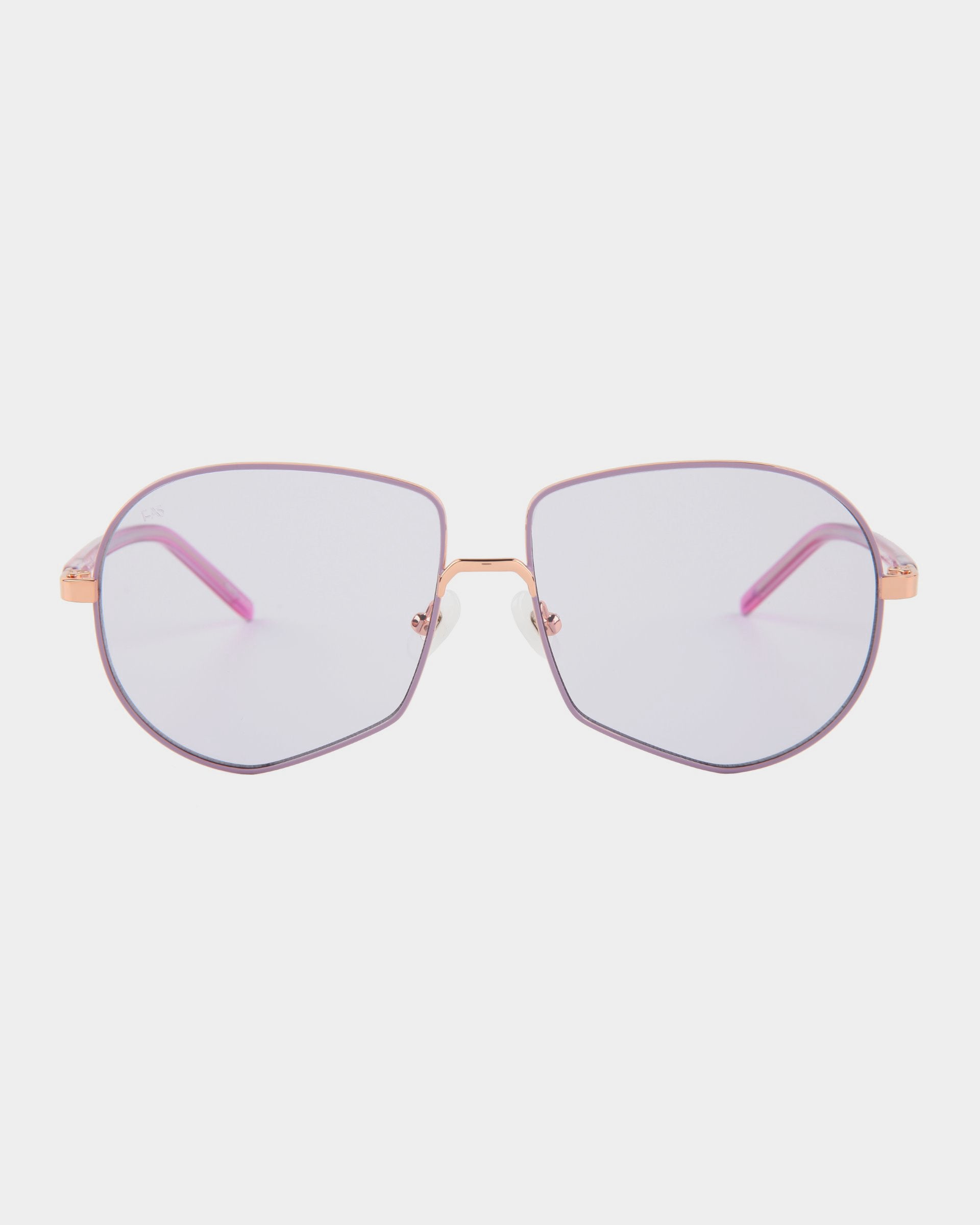 The Explorer by For Art's Sake® is a pair of eyeglasses featuring thin, rose gold frames and light pink UV-protected nylon lenses. These glasses showcase a geometric shape with subtly rounded edges. The bridge and nose pads are also crafted in rose gold, while the temples come with matching pink tips.