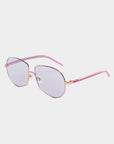 A pair of stylish Explorer sunglasses by For Art's Sake® featuring sleek pink metal frames and lightly UV protected nylon lenses. The arms of the glasses boast a pink hue with a subtle gradient effect, all set against a plain white background.