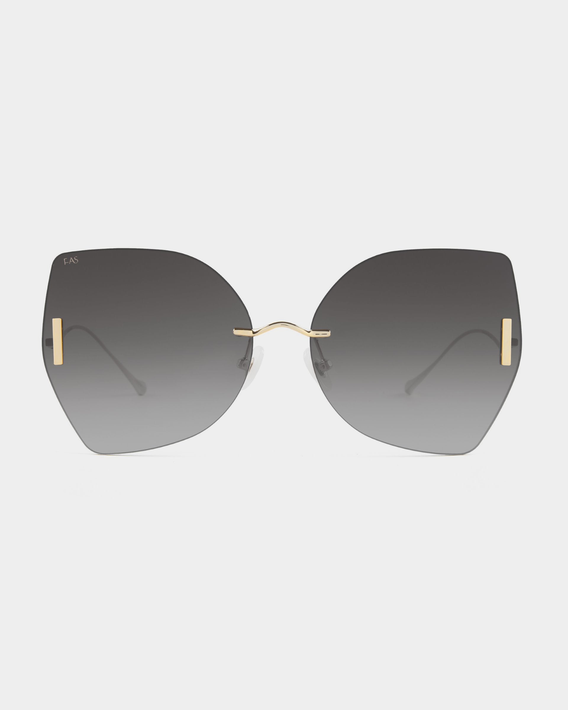 The Starlight sunglasses by For Art's Sake® feature stylish, oversized, butterfly-shaped frames with gradient dark lenses. These chic sunglasses include a minimalist gold-plated stainless steel bridge and thin temples. Their ultralightweight shatter-resistant lenses offer 100% UV protection while delivering a contemporary, fashionable look.