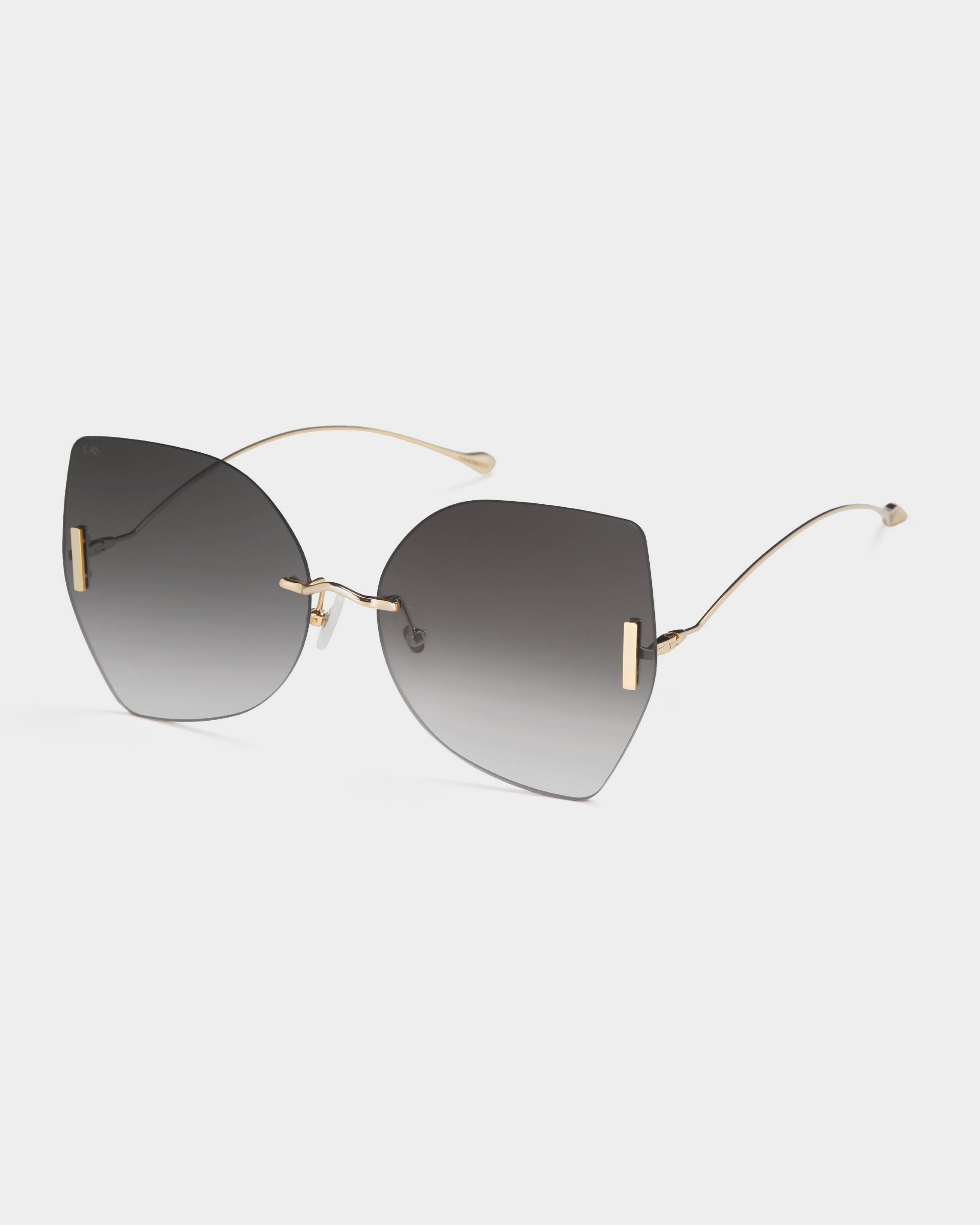 Introducing the Starlight sunglasses by For Art's Sake®. These stylish, frameless shades feature dark gradient, ultralightweight shatter-resistant lenses and thin, gold-tone arms. Adorned with gold bridge accents and showcasing a modern, elegant design, they offer 100% UV protection for your eyes.
