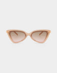 A pair of Mad Mad sunglasses by For Art's Sake® with stylish cat-eye frames in light beige acetate and gradient brown lenses, viewed from the front against a plain white background. The design features slightly rounded edges and metallic accents on the temples.