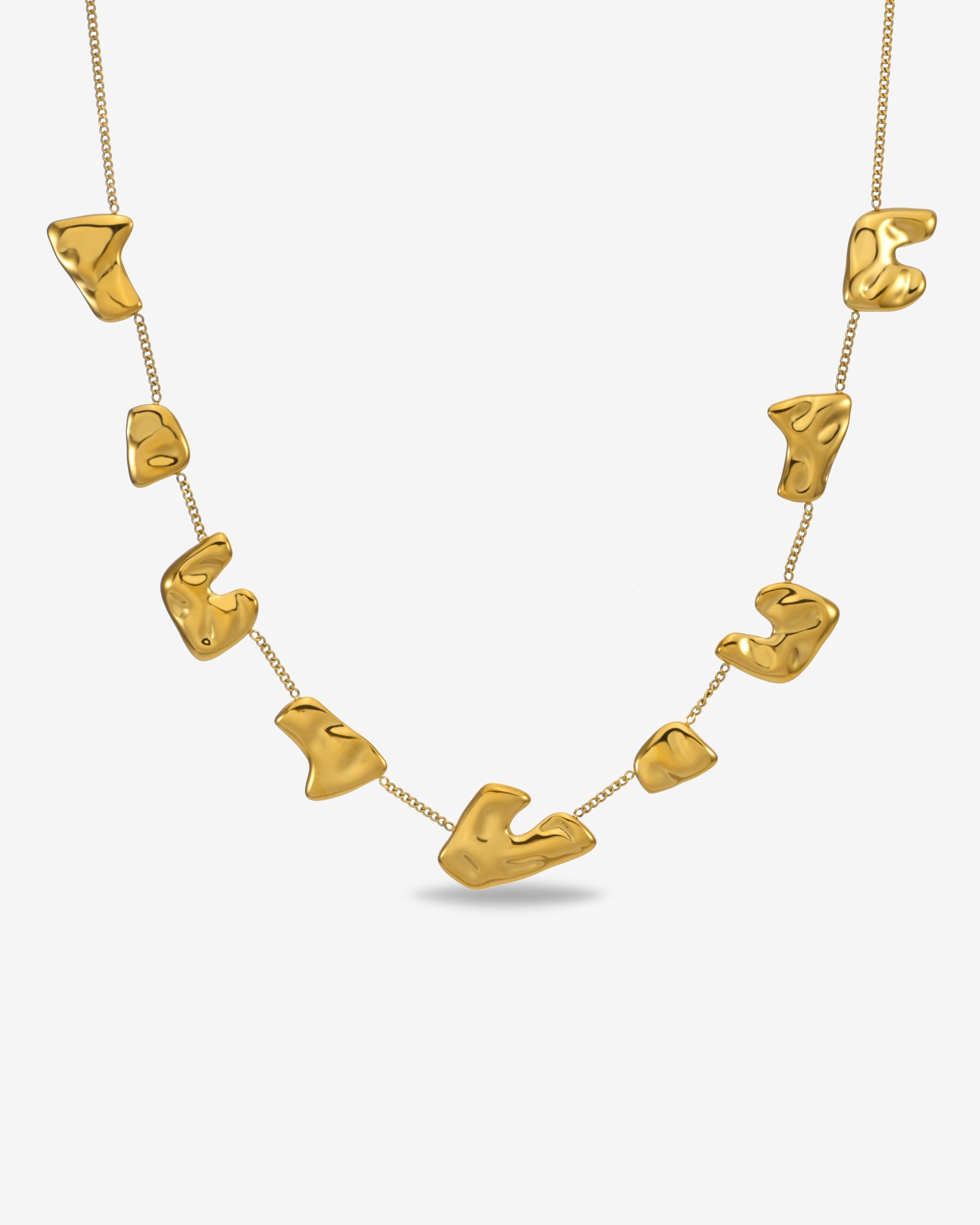 The Forms Necklace by For Art's Sake® features polished, irregular gold shapes on a delicate chain, shown against a plain white background.